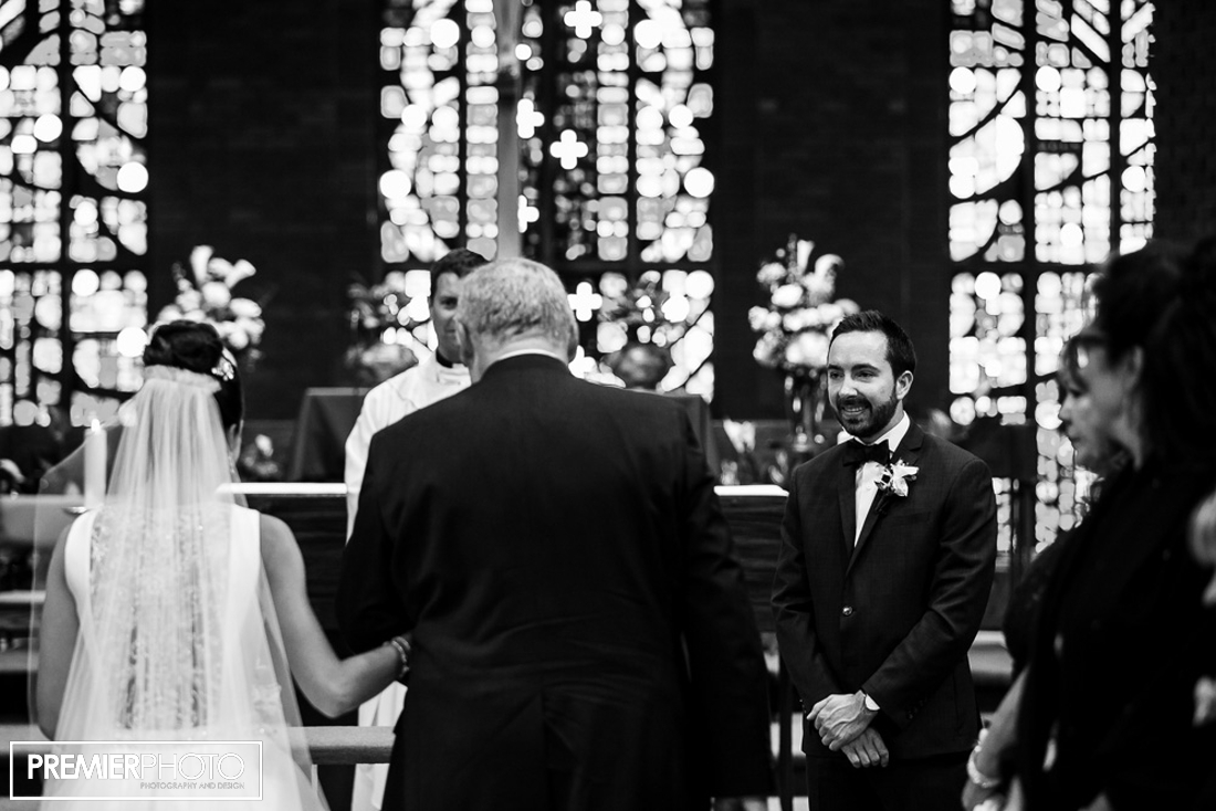 Bride being walked at the altar by her father