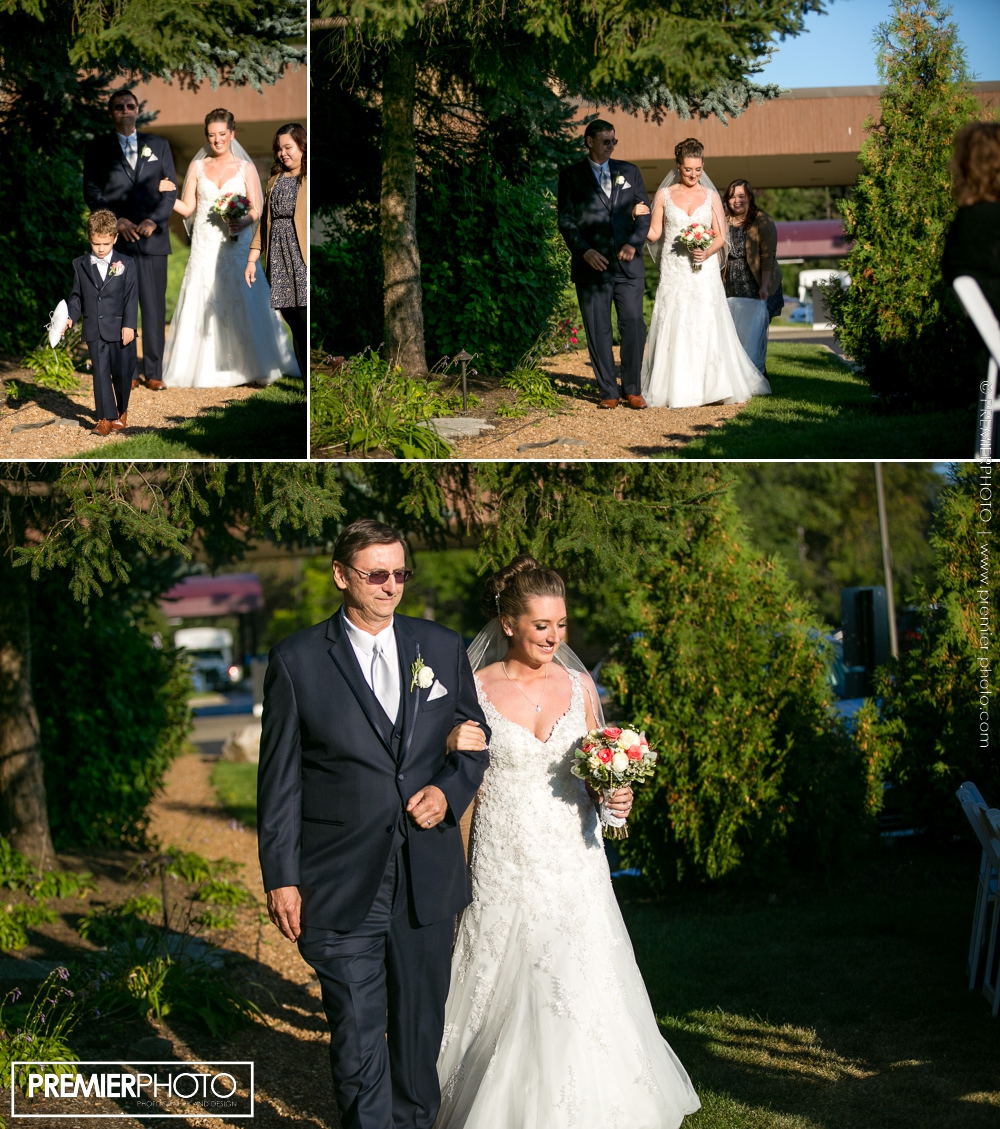 Bride walking the isle with her father; outdoor wedding ceremony - Hilton, Northbrook IL 