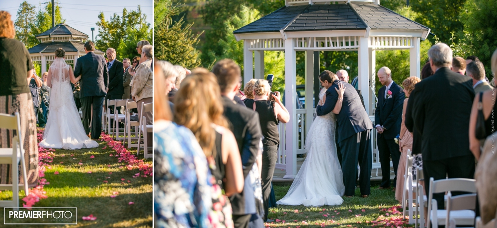 Bride walking the isle with her father; Gazebo wedding ceremony - Hilton, Northbrook IL 