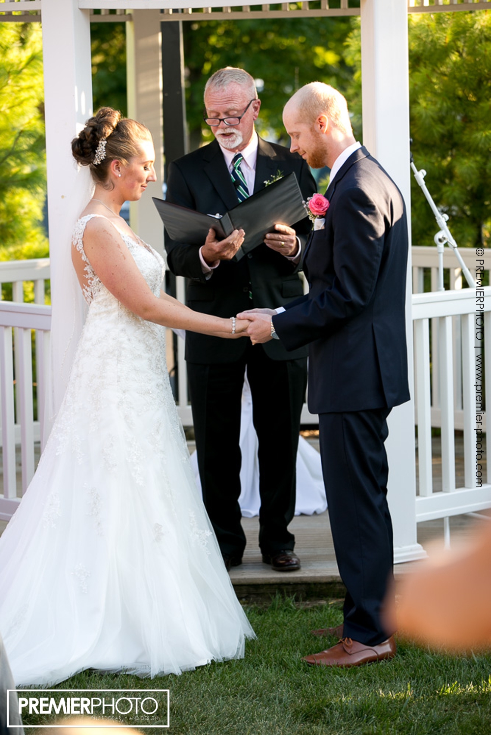 Officiant declaring newly weds husbandt and wife! Exceptional and elegant outdoor wedding ceremony