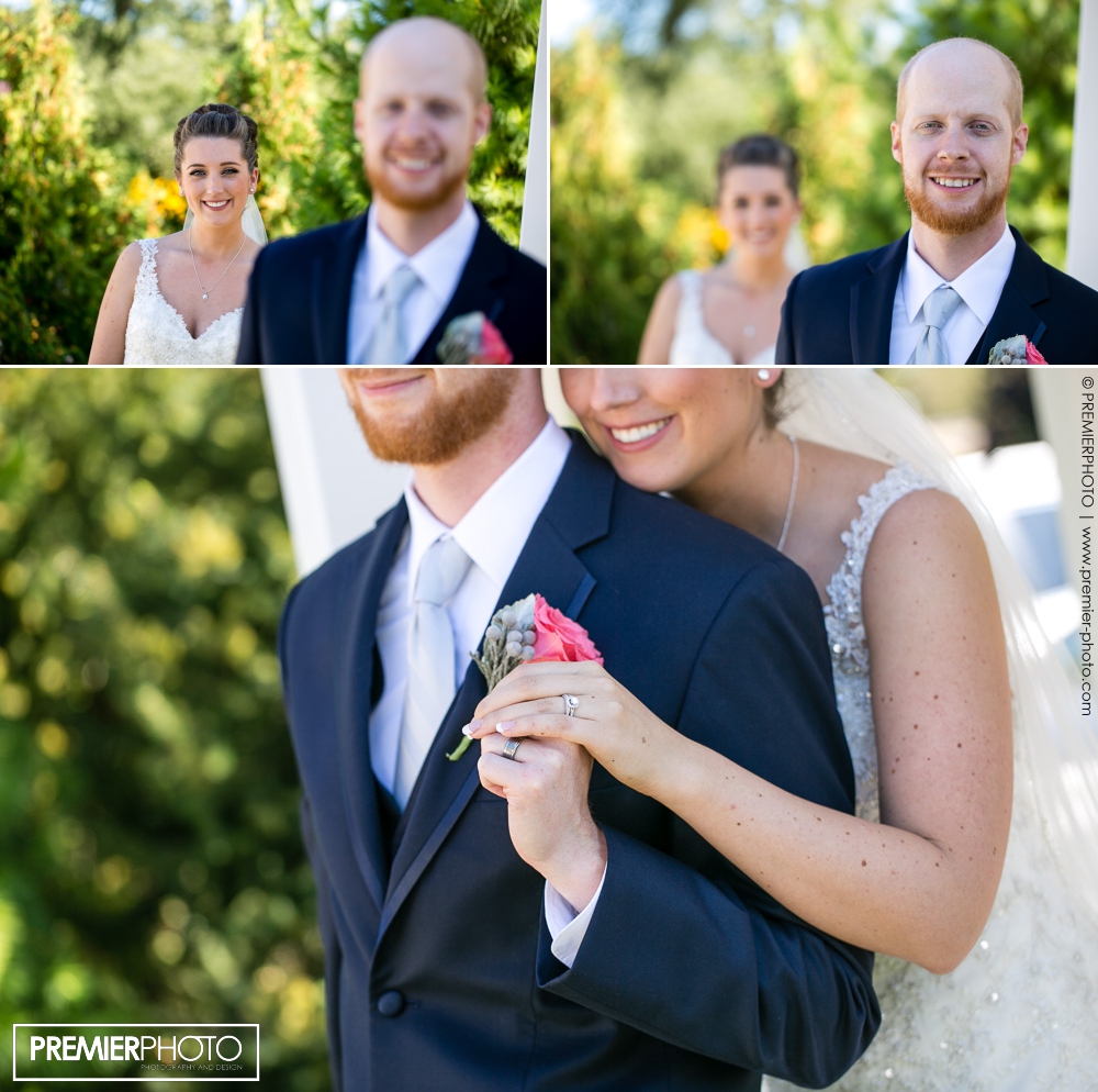 Portrait of bride and groom showing their wedding rings